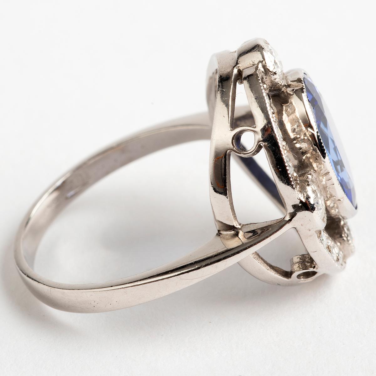 Oval Cut Tanzanite 'Est8.5 Carat' & Diamond Cluster Ring 'Est1.00 Carat', 18K White Gold
