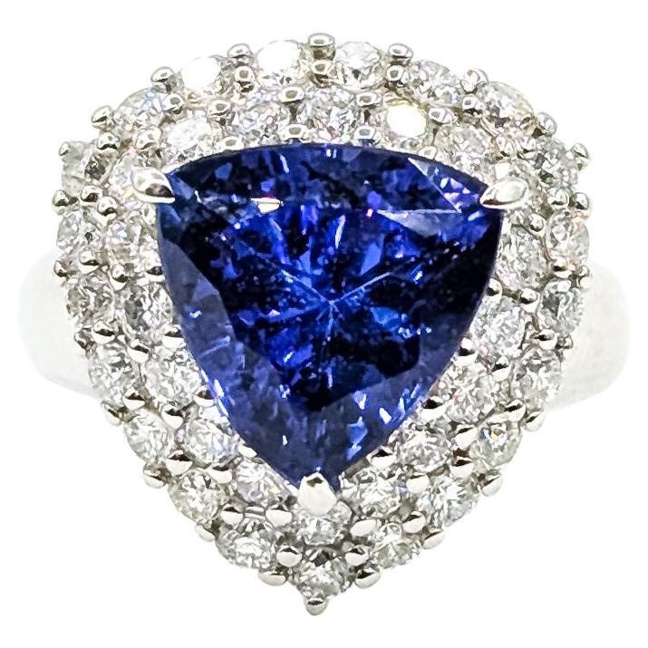 Cocktailring mit Tansanit und Diamant aus Platin