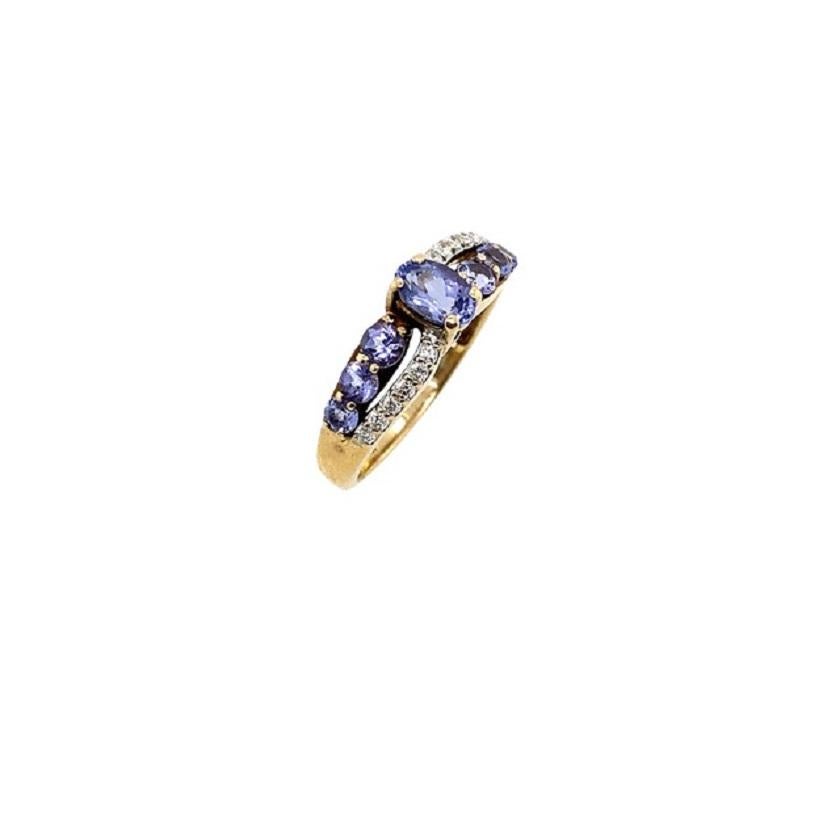 Tanzanite & Diamond Crossover Ring, Set In Yellow Gold

Additional Information:
In very good condition
Hallmarked faded but tested as 9ct Gold
Total Diamond Weight: 0.08ct
Diamond Colour: G/H
Diamond Clarity: SI
Total Weight: 2.6g
Ring Size: