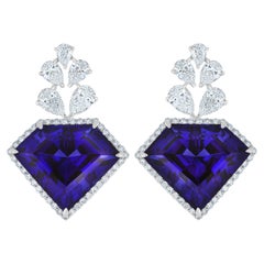 Boucles d'oreilles en or blanc 18 carats Tanzanite et diamant