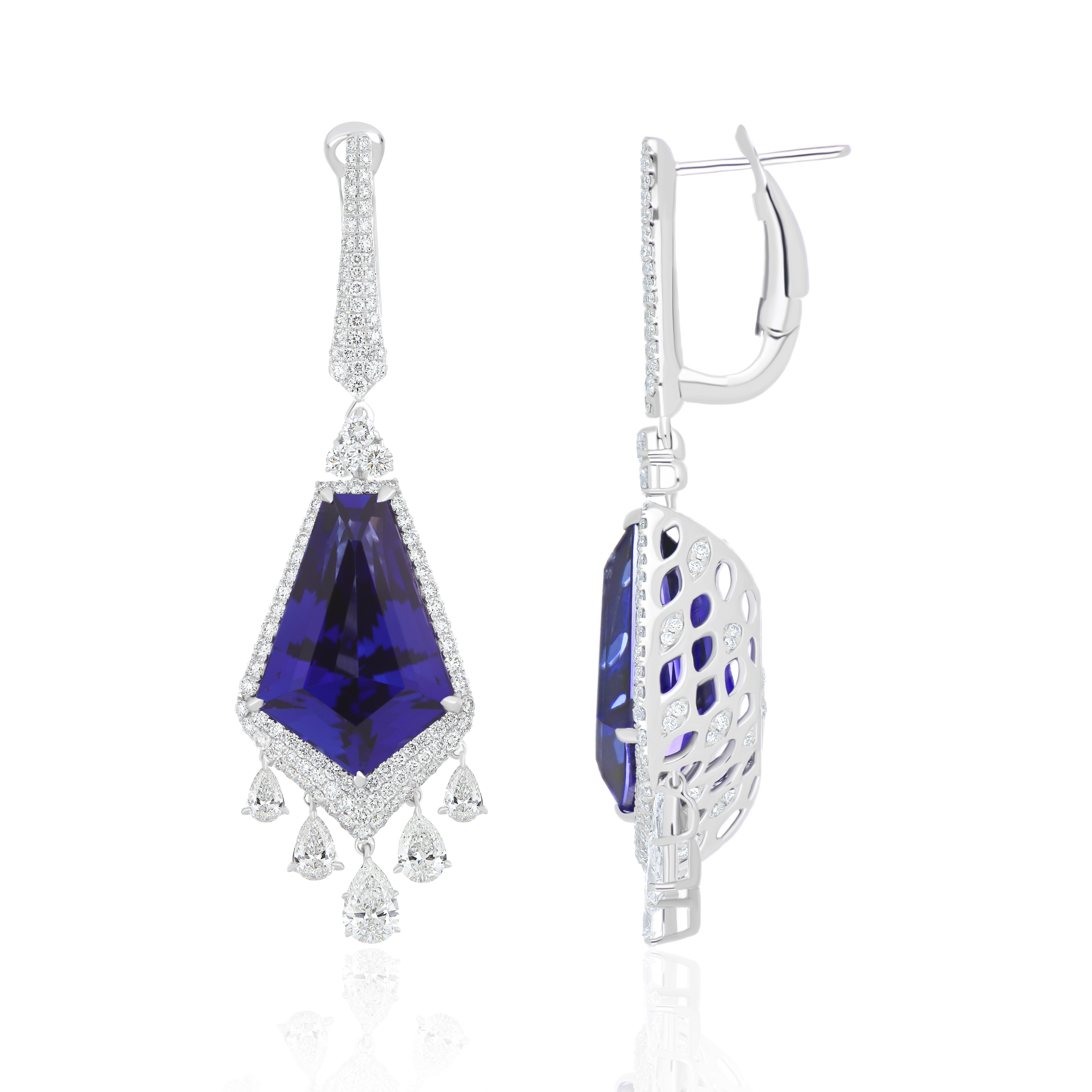 Elegant and Exquisitely detailed White Gold Earring, with 26.5 Cts (approx) Tanzanite Exquisitely cut in Fancy Shape accented with micro pave Diamonds, weighing approx. 4.00 Ct's.(approx) total carat weight. Beautifully Hand-Crafted fro your special