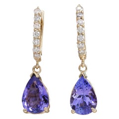 Tanzanite Diamond Earrings In 14 Karat Yellow Gold