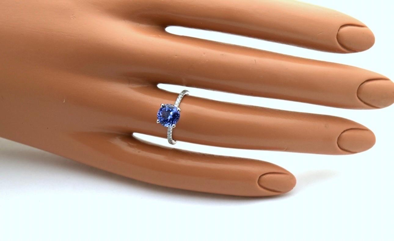 Femenino o masculino Tanzanita Diamante anillo de compromiso 18KT oro en venta