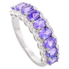 Anello di fidanzamento a mezza eternità con diamante tanzanite in oro bianco massiccio 14 carati