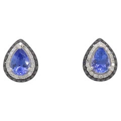 Boucles d'oreilles halo en tanzanite et diamant fabriquées par EFFY