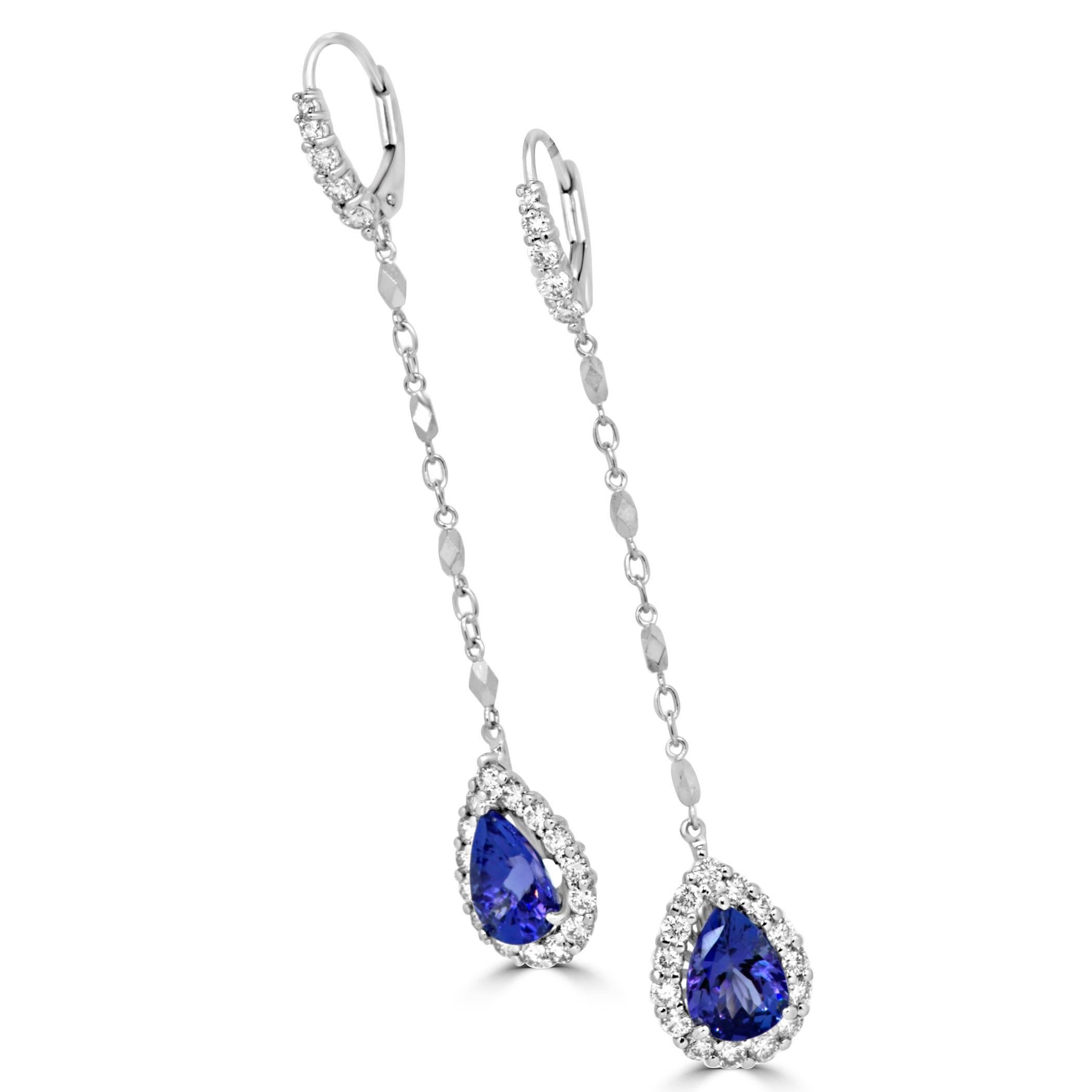 Gorgeous 2 Tanzanite Pear Shape 3.55 Carat Encircled in a single Halo of White Round Diamonds 1.29 Carat in 14K White Gold Dangle Earrings.

Style available in different price ranges. Prices are based on your selection of 4C's Cut, Color, Carat,