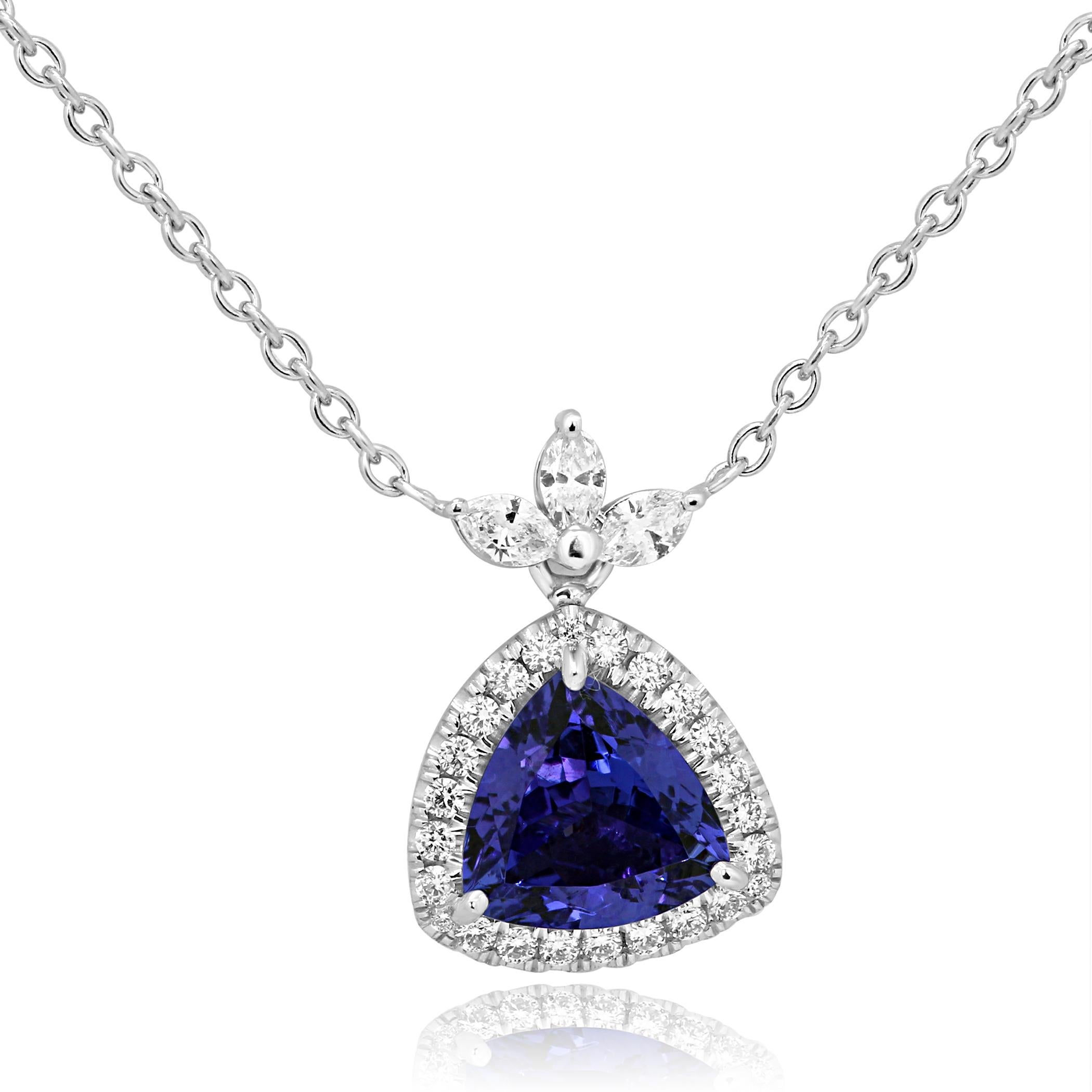 Stunning Tanzanite trillion 2.41 Carat encircled in a single Halo of Colorless Round Dimonds VS Clarity 0.24 Carat with 3 Colorless Marquise Diamond VS clarity 0.23 Carat in 14K White Gold Pendant Necklace.

Style available in different price