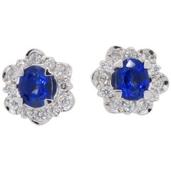 Tanzanite and Diamond Halo Stud Earrings in 18 Karat White Gold