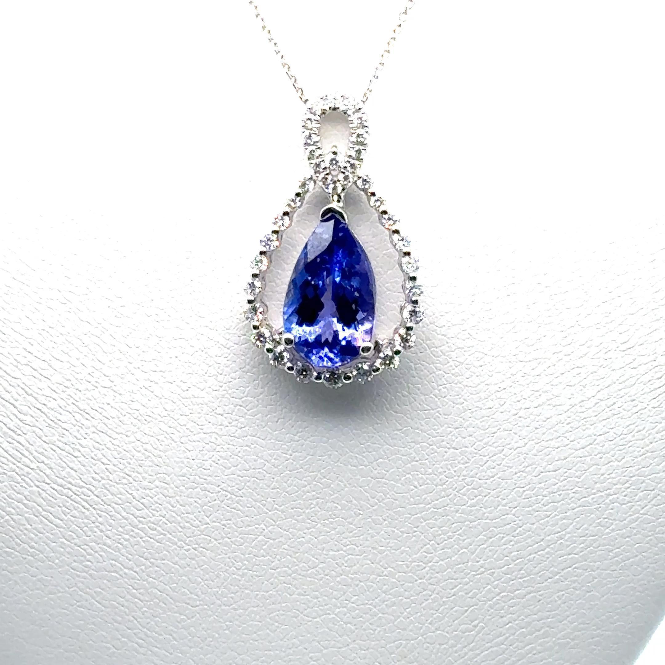 Modern Tanzanite Diamond Pendant With 18KW GOLD For Sale