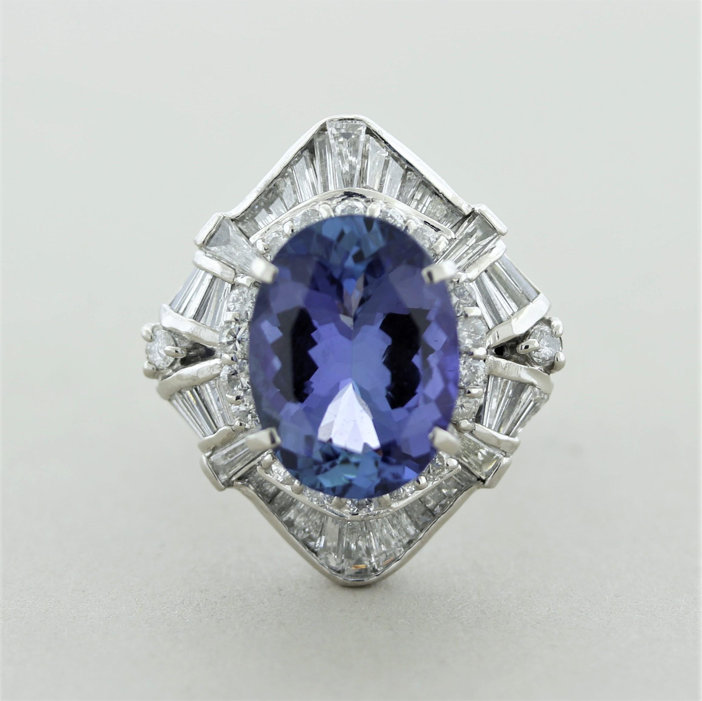 A big and bold cocktail ring featuring a 8.32 carat oval-shaped tanzanite. Tanzanite is known for its pleochroism, ability to see two when viewed at different angles, showing both blue and a rich purple color. The stone is cut in a way where both