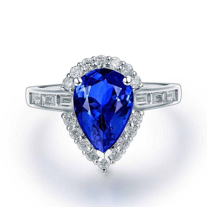 
1.99 Carat Tanzanite  Ring  with 22 Diamonds set in 18 Karat White Gold.  It has round Diamonds around the centre stone and baguette cut ones on the band.  If you are looking for anything specific let us know and see our main page too. 