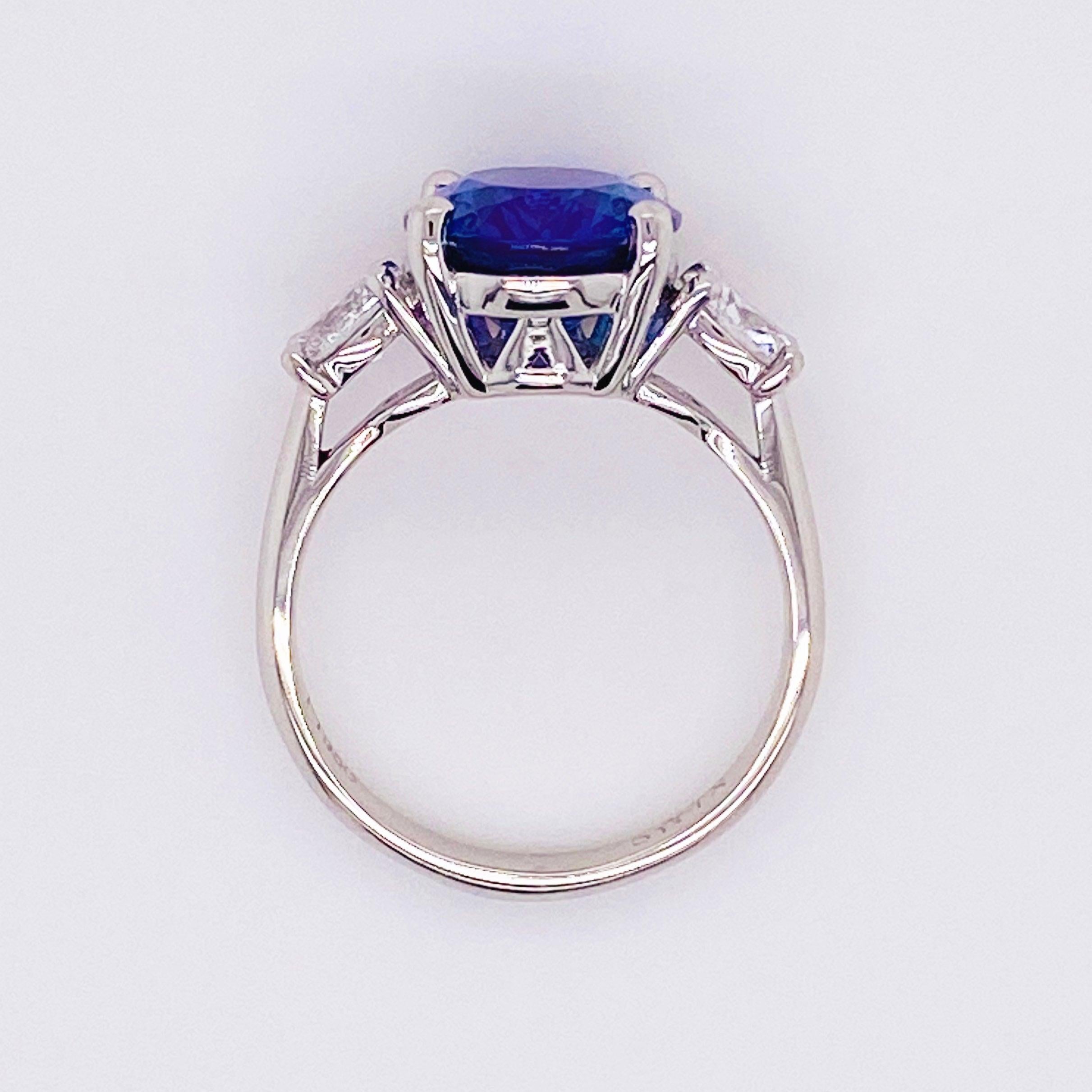 For Sale:  Tanzanite Diamond Ring, 4.77 Carat Tanz, 14 Karat Gold Three-Stone Ring 3