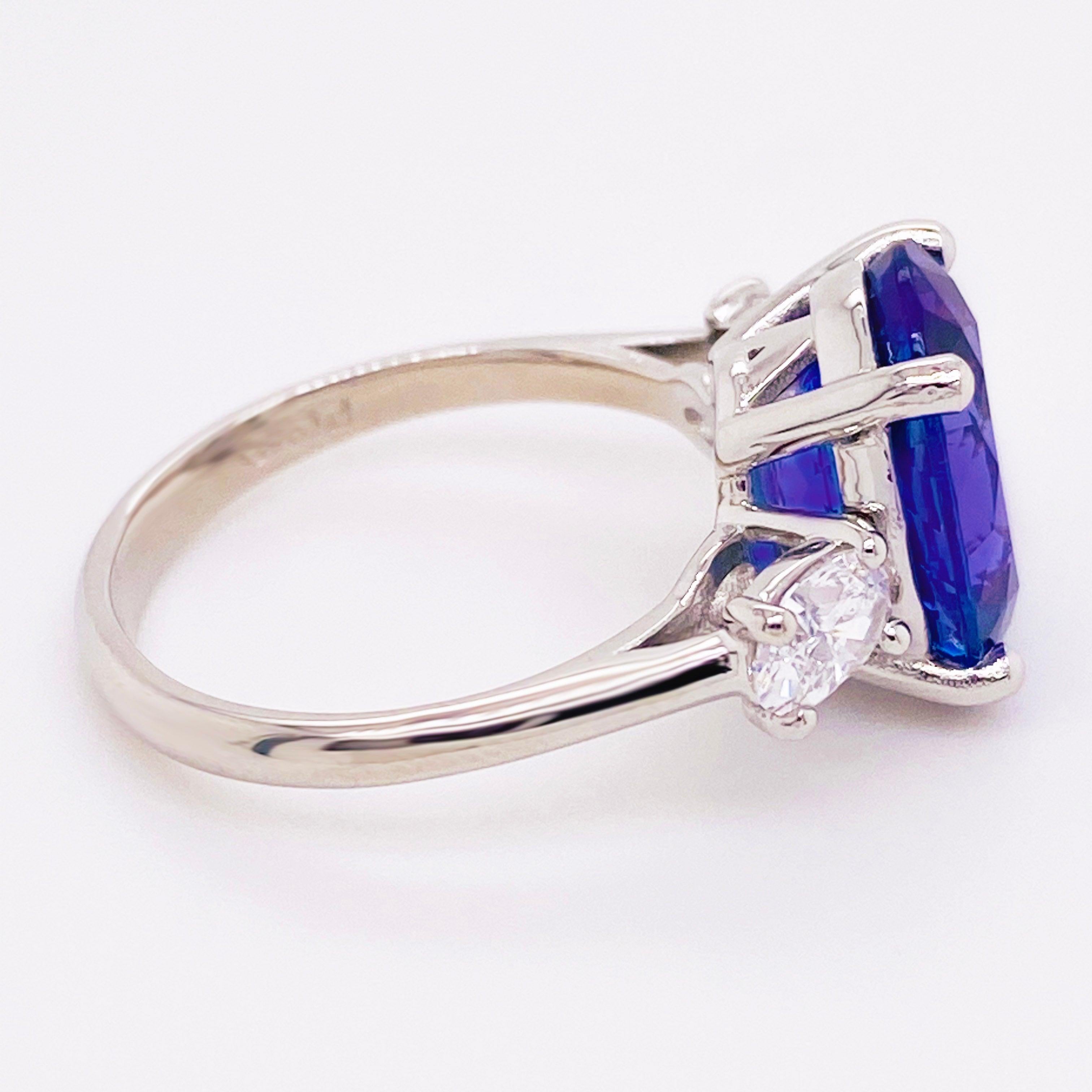 For Sale:  Tanzanite Diamond Ring, 4.77 Carat Tanz, 14 Karat Gold Three-Stone Ring 4