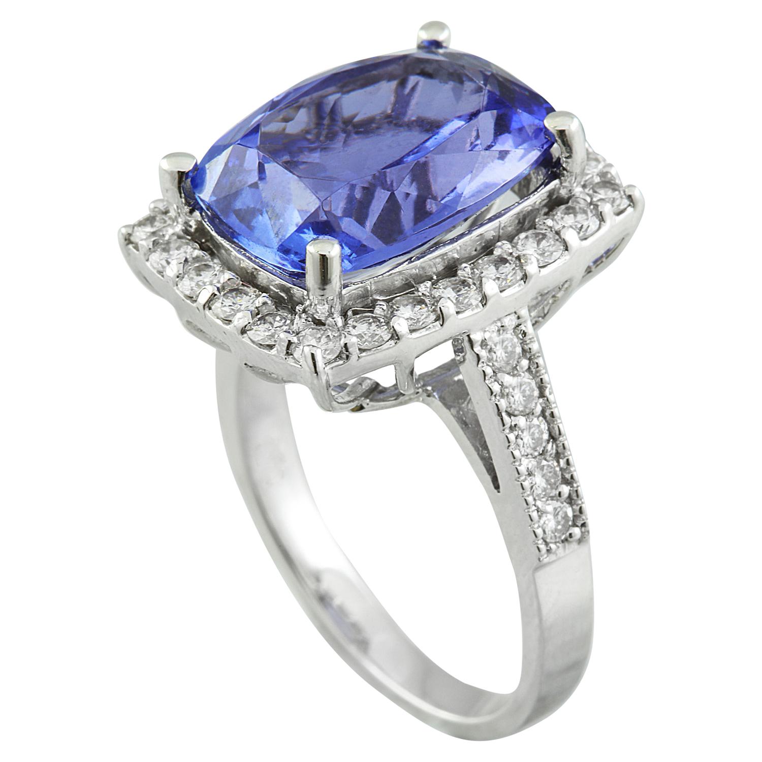 8.55 Carat Natural Tanzanite 14 Karat Solid White Gold Diamond Ring
Stamped: 14K 
Total Ring Weight: 6 Grams 
Tanzanite Weight: 7.65 Carat (14.00x10.00 Millimeters) 
Diamond Weight: 0.90 Carat (F-G Color, VS2-SI1 Clarity )
Face Measures: 17.15x13.80
