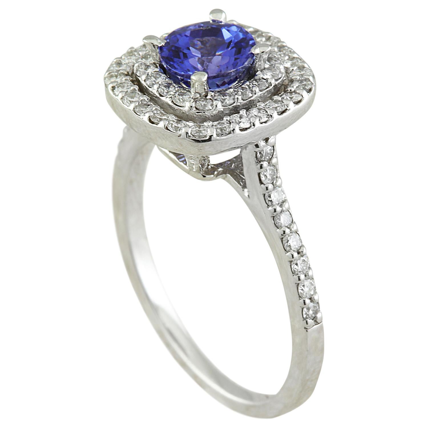 1.30 Carat Natural Tanzanite 14 Karat Solid White Gold Diamond Ring
Stamped: 14K 
Ring Size: 7
Total Ring Weight: 3.6 Grams
Tanzanite Weight: 0.70 Carat (5.50x5.50 Millimeter)
Shape: Round
Color: Blue
Diamond Weight: 0.60 Carat (F-G Color, VS2-SI1