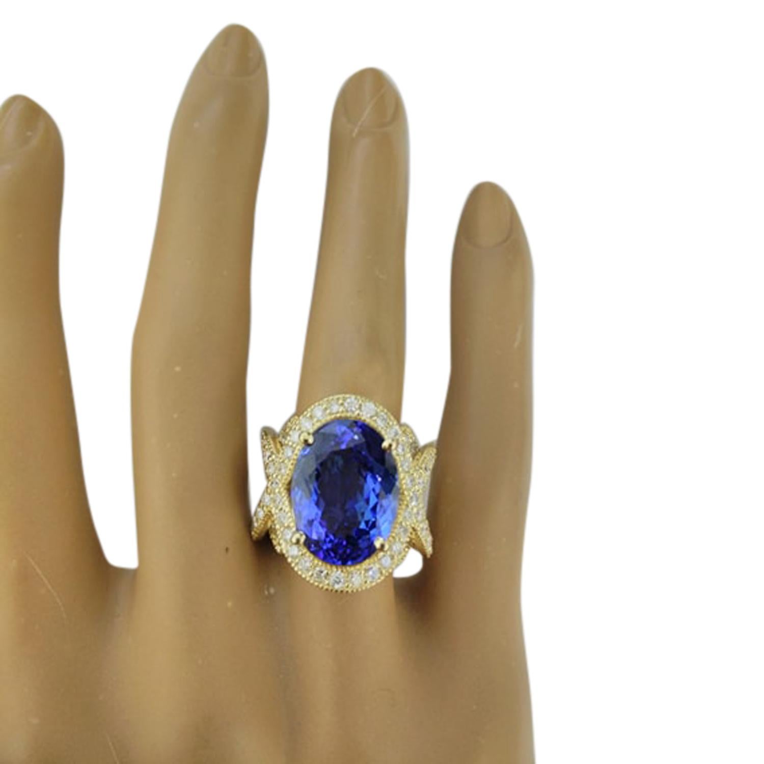 10.58 Carat Natural Tanzanite 14 Karat Solid Yellow Gold Diamond Ring
Stamped: 14K 
Total Ring Weight: 13 Grams 
Center Tanzanite Weight: 8.58 Carat (15.00x11.00 Millimeters) 
Diamond Weight: 2.00 Carat (F-G Color, VS2-SI1 Clarity)
Quantity: 88
Face