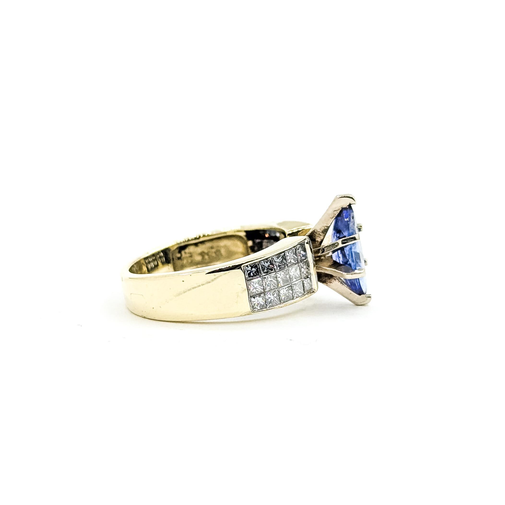 Bague en or jaune 14k avec tanzanite et diamant en vente 1