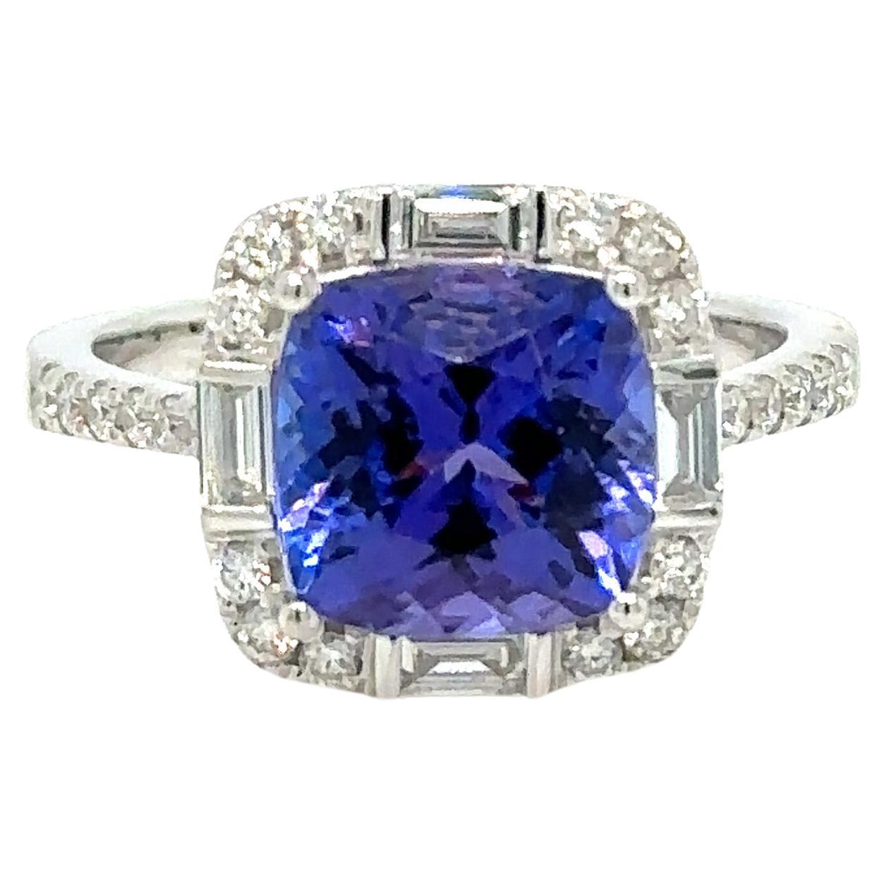 Cushion-shape Tanzanite Ring with bright Diamonds from all corners and sizes.

Secure Yours Today: Limited stock available. Don't miss the chance to secure your Tanzanite Diamond Ring today. It's not just a ring; it's a way of fashion.

Product