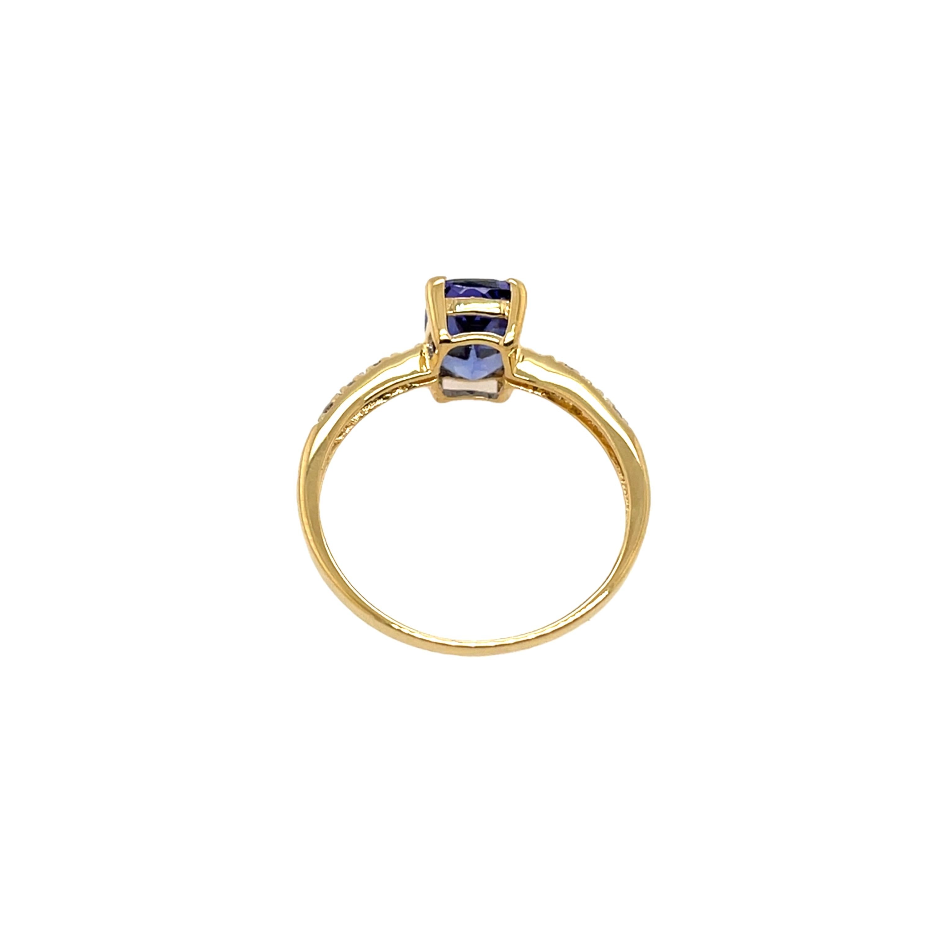Bague en or jaune 18ct avec tanzanite et diamant en vente 1