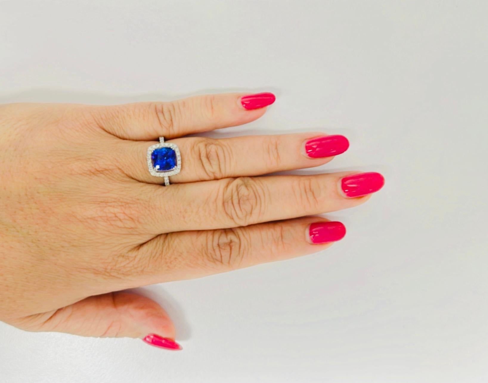 Women's or Men's 8.6mm, Tanzanite Diamond set in 14K White Gold Ring For Sale