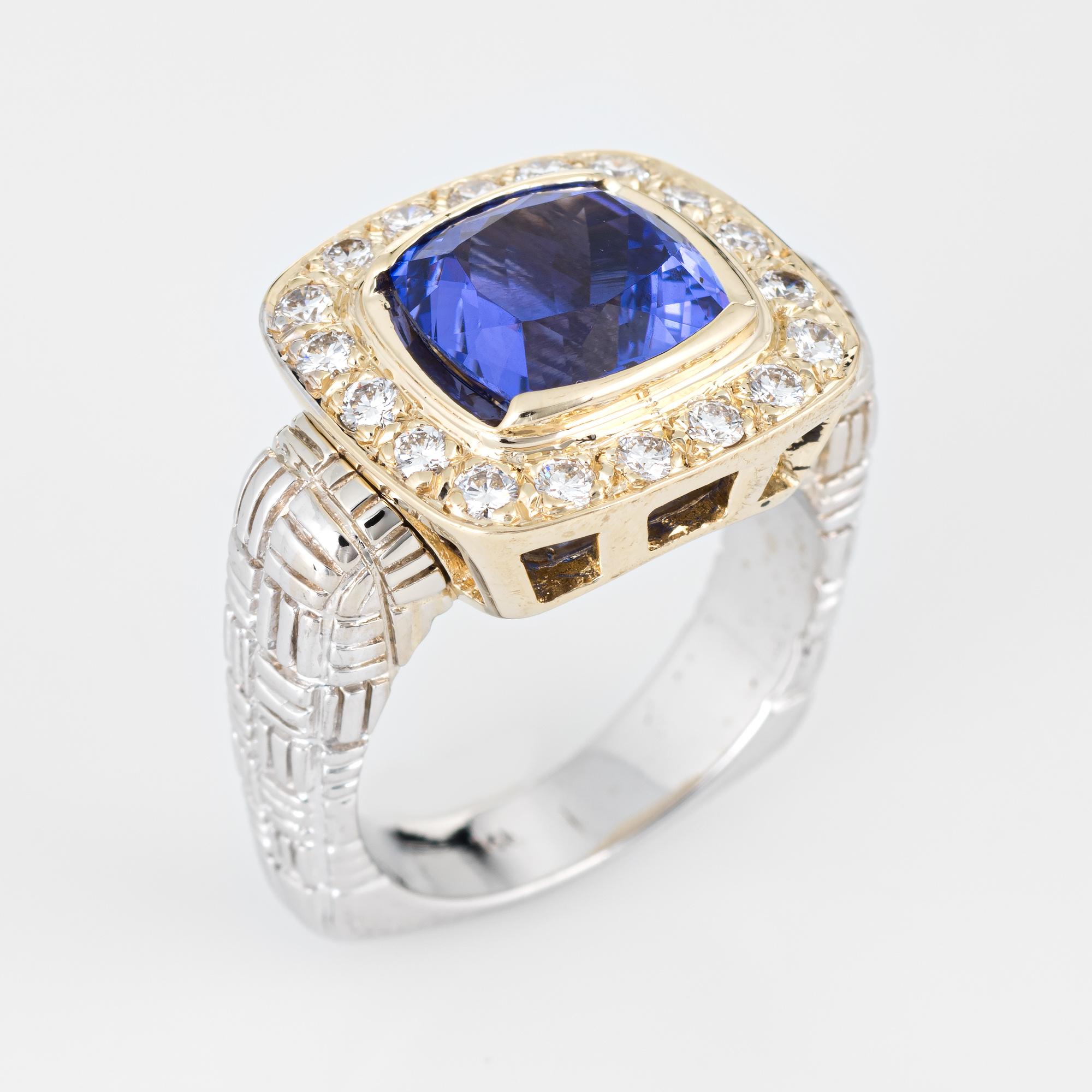 Finely detailed vintage tanzanite & diamond square cocktail ring (circa 1980s to 1990s) crafted in 14 karat yellow & white gold. 

Cushion cut faceted tanzanite measures 10mm x 8mm (estimated at 3.50 carats), accented with 18 estimated 0.04 carat
