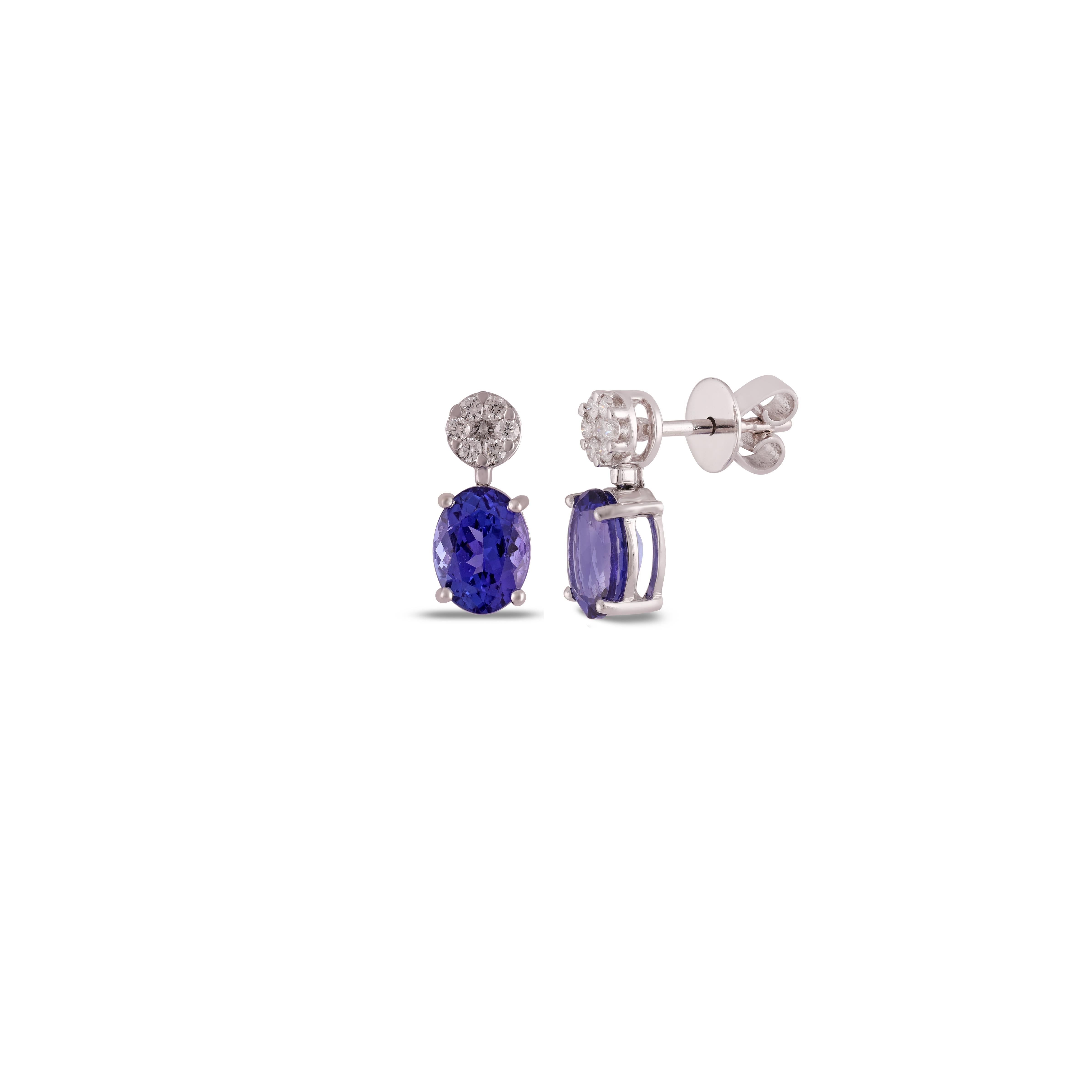 Contemporary Tanzanite & Diamond Stud Earrings Studded in 18k White Gold For Sale