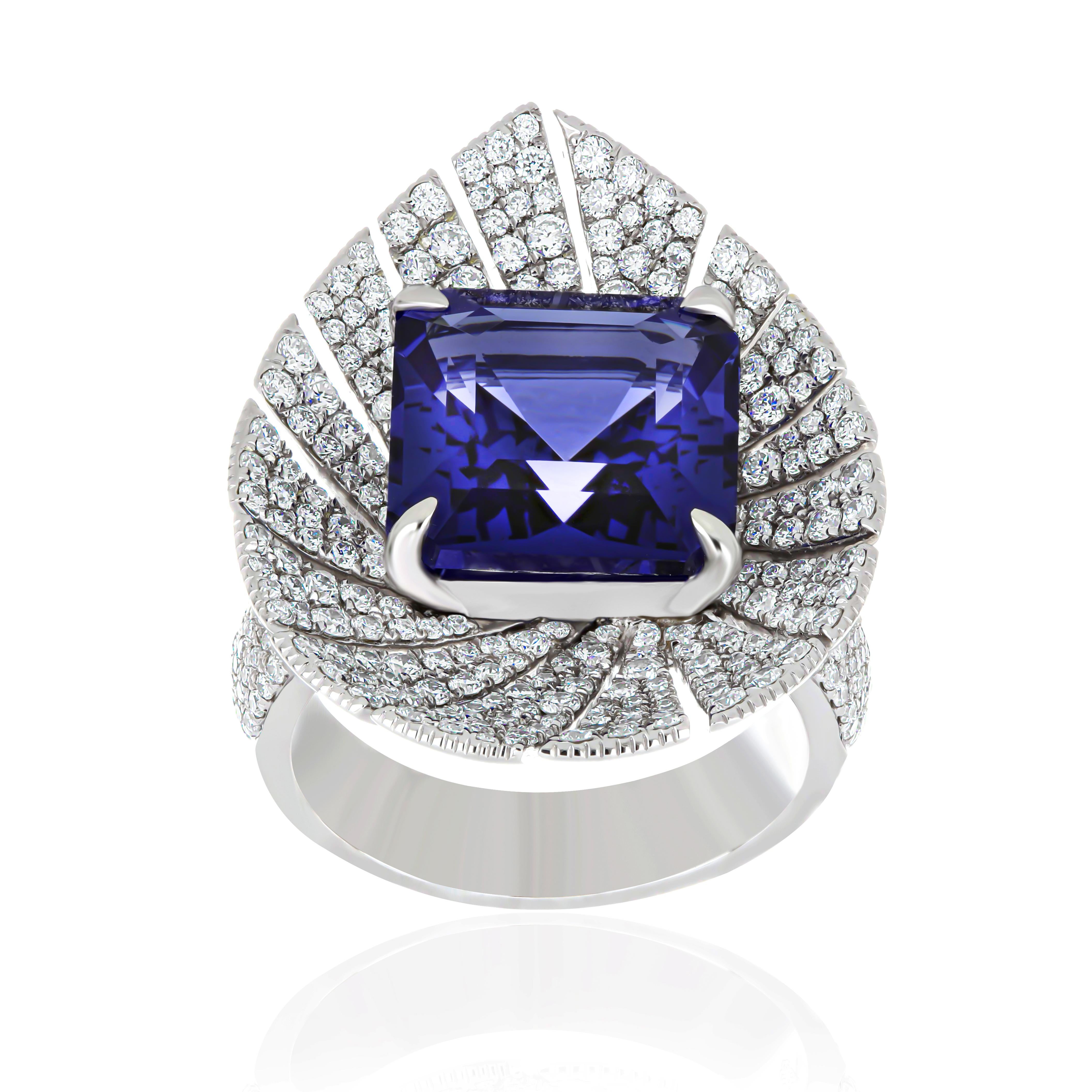 Elegant and Exquisitely detailed White Gold Ring, with a rare 9.1 Cts (approx.) Octagon Shape Cut Tanzanite set in the center beautifully accented with Micro pave set Diamonds, weighing approx. 2.1  CT's (approx.) total carat weight to further