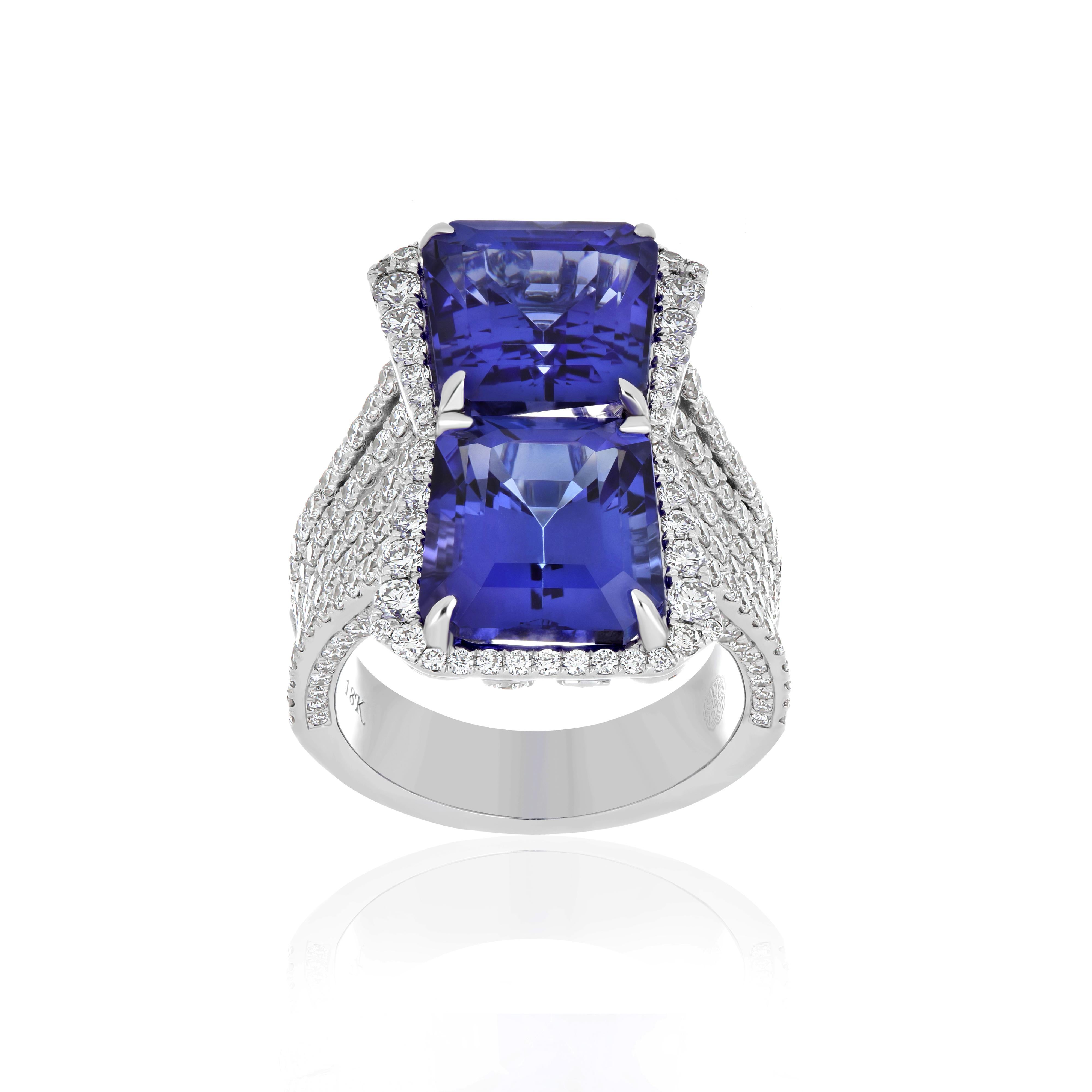 Elegant and Exquisitely detailed White Gold Ring, with 12.80 Cts (approx total Carat weight) Two Octagon Cut Tanzanite set in the center with Micro pave set Diamonds, weighing approx. 2.2 Cts. (approx.) total carat weight to further enhance the