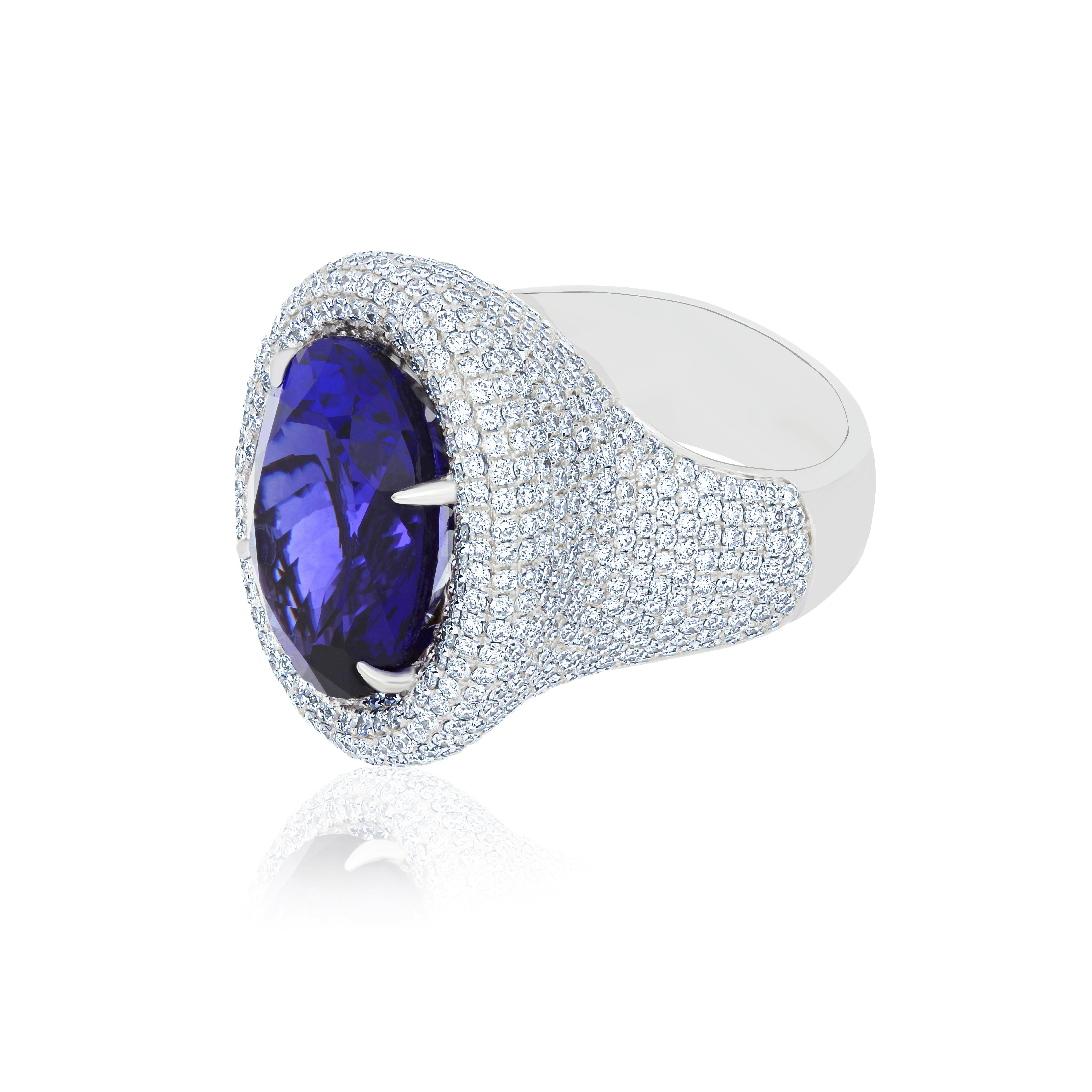 Oval Cut Tanzanite & Diamond Studded Ring in 18 Karat White Gold For Sale