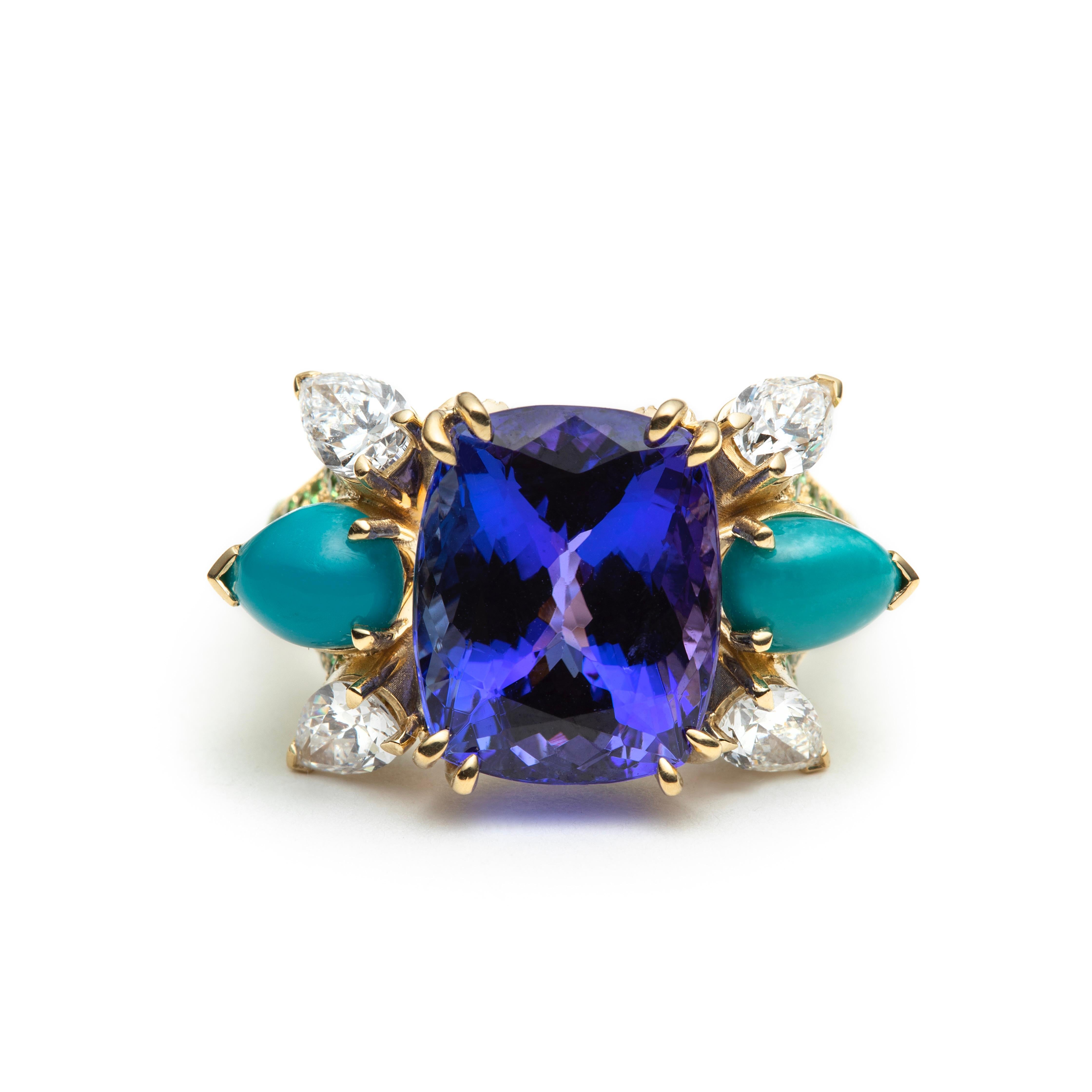Our Drakaina ring is an eye-catching one-of-a-kind ring in 18K yellow gold with a highly polished finish. The vivid purplish-blue, cushion cut tanzanite is held in place by four double prongs that sit in a U setting. It weighs 9.6 carat. The fancy V
