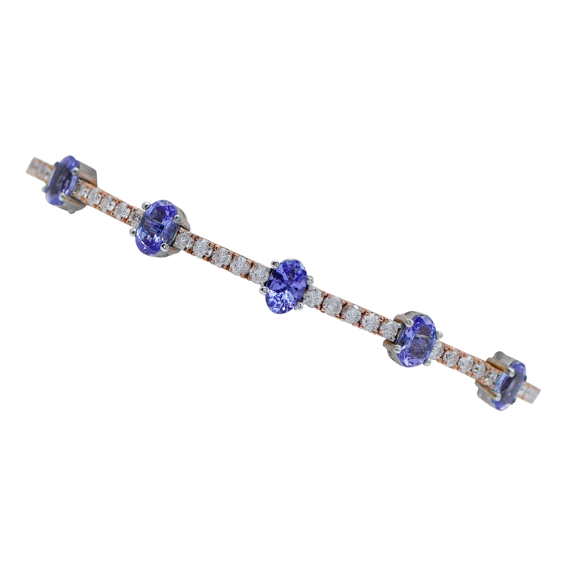 Bracciale in tanzanite, diamanti, oro rosa e bianco 18 carati. in vendita