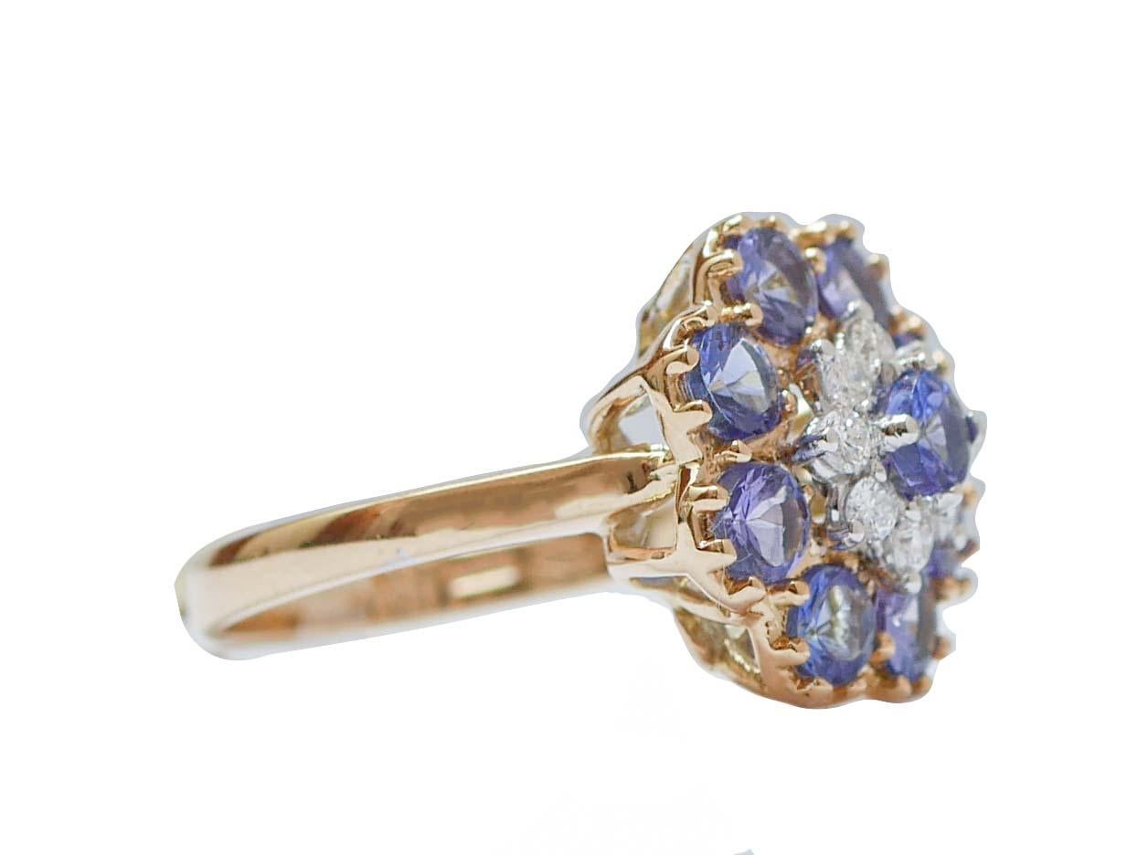Elegant modern ring in 18 kt rose gold structure mounted with a flower of tanzanite and a flower of diamonds in the central part.
Diamonds 0.80 ct
Tanzanite 2.55 ct
Total Weight 5.10 gr
RF   G   FEOI
RK.AICC80
Italian Size  14
Usa Size 6.84
French