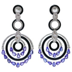 Orecchini con tanzanite, diamanti, onice, platino e oro bianco 14 carati