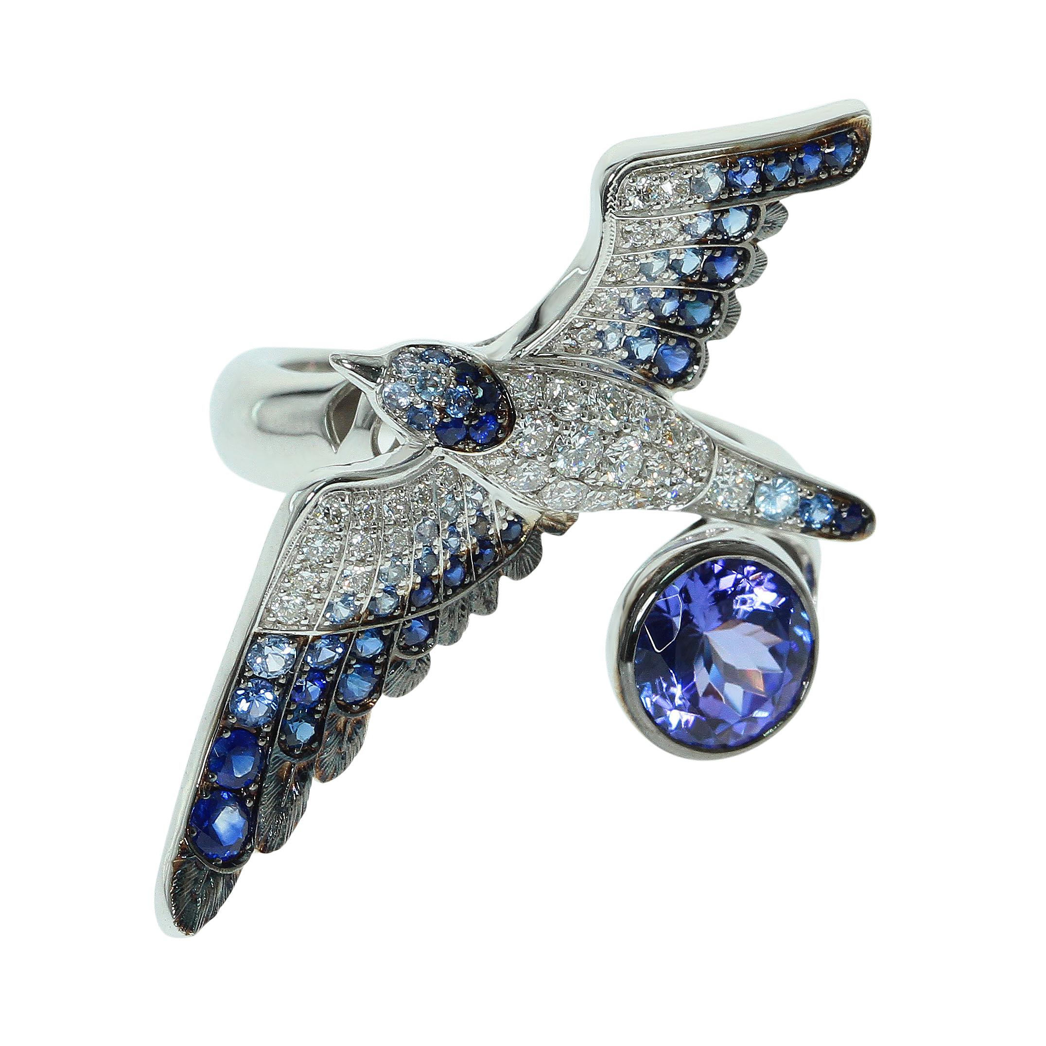 Tanzanite Diamonds Sapphire 18 Karat White Gold Seagull Ring
Highly detailed Seagull Ring. Combination of 35 White Diamonds and 52 Blue Sapphires gives fully impression that they are alive. And luminous 1.94 Carat Tanzanite only emphasises it. If