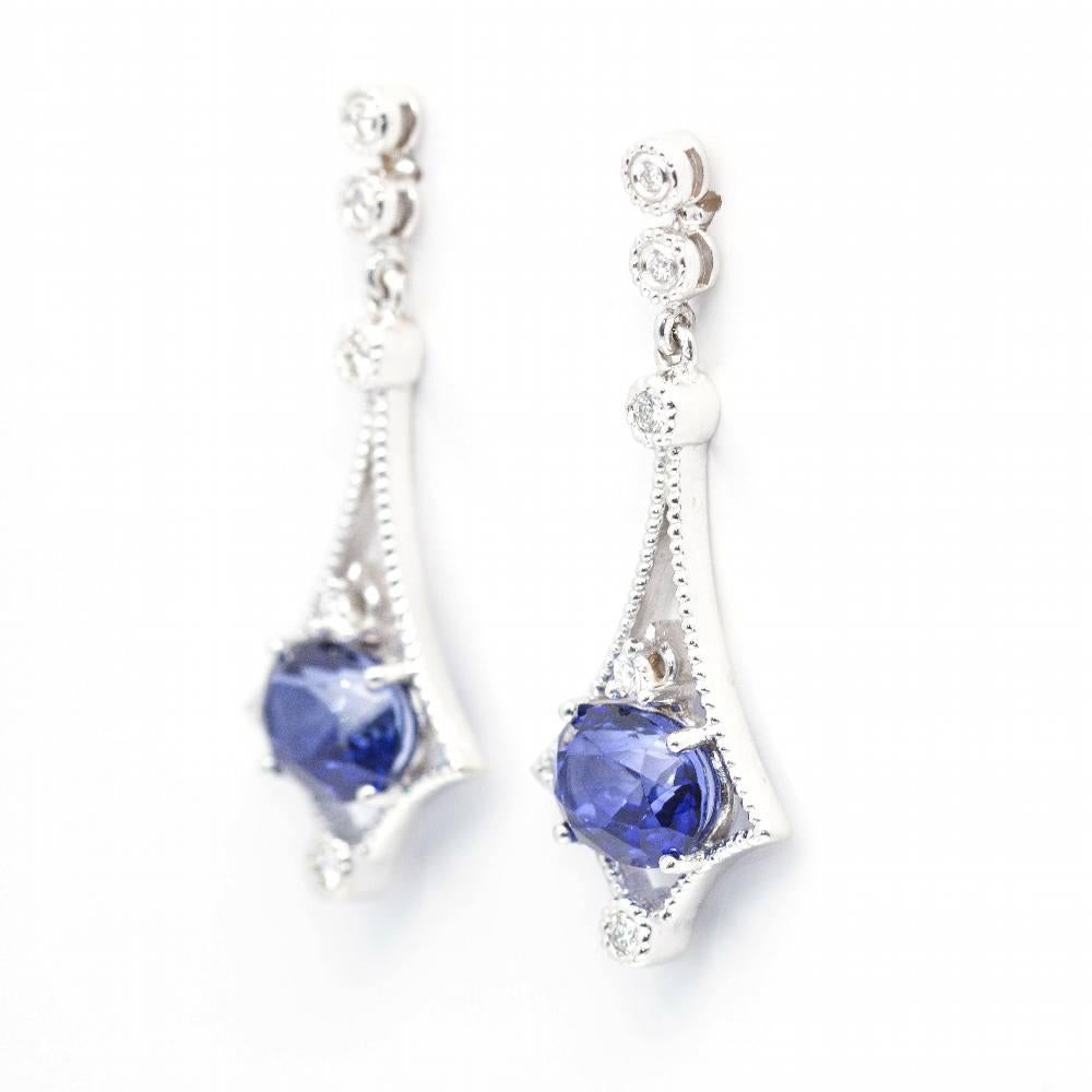 Vintage Style Gold Earrings with Tanzanite for women : Brilliant Cut Diamonds weighing 0,17ct  2x Tanzanites 8x5mm  Clasp : 18kt White Gold  5,65 grams.  Measures: 3.0cm long and 1.3cm wide  Brand new item  Ref: D361154SP