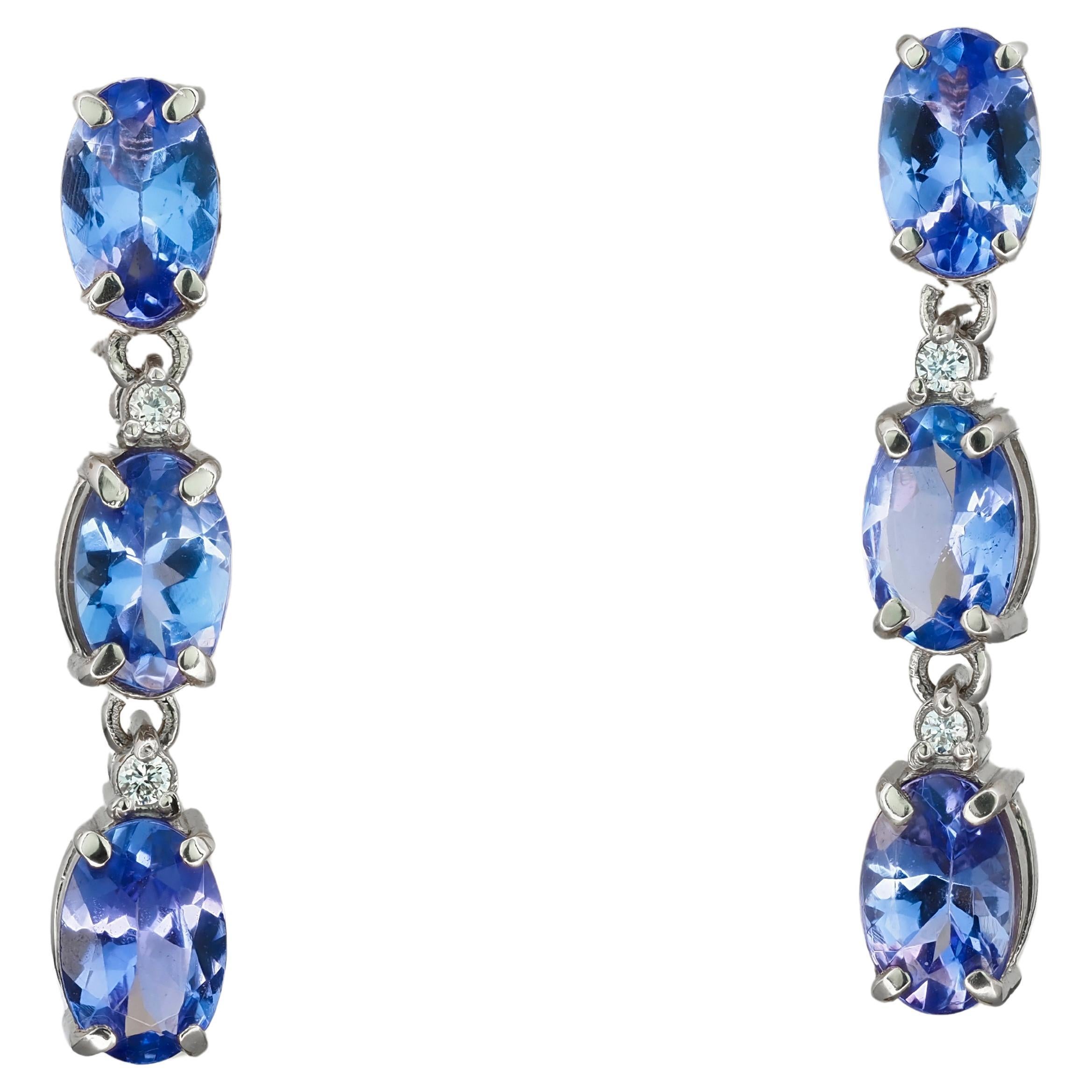 Tanzanite earrings studs in 14k solid gold.
