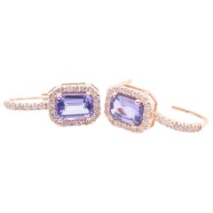 Tanzanite Earrings with a Halo of Diamonds Set in Rose Gold