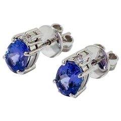Clous d'oreilles en or blanc 750 avec tanzanite et diamants