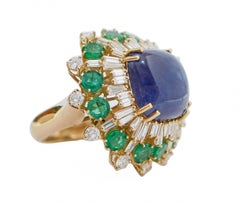 Tanzanite, Emeralds, Diamonds, 18 Karat Yellow Gold Ring.
