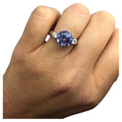 Tanzanite engagement ring 18KT gold rare deep color tanzanite
