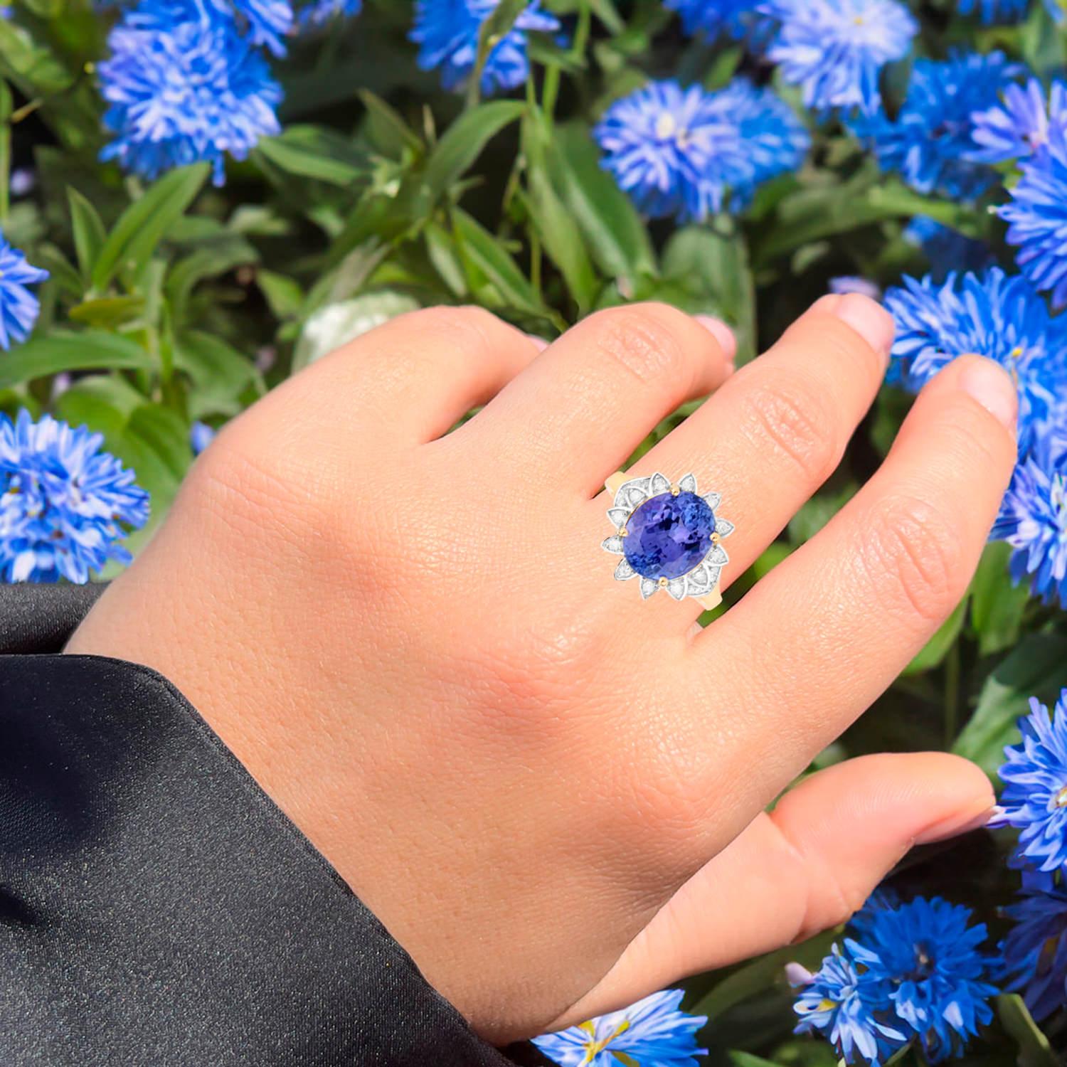 It comes with the Gemological Appraisal by GIA GG/AJP
All gemstones are natural
Tanzanite = 5.40 Carats
22 Diamonds = 0.22 Carats
Metal: 14K Yellow Gold
Ring Size: 7 US*
*It can be resized complimentary