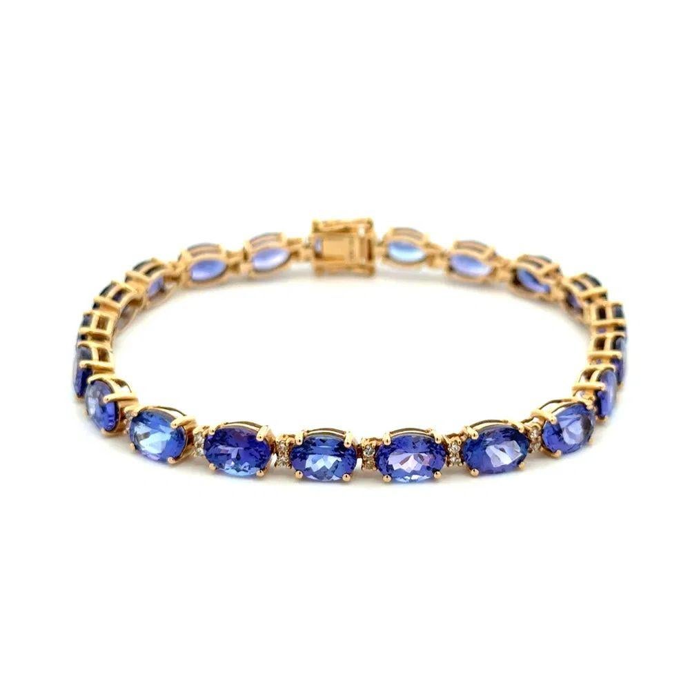 Sencillamente hermoso Pulsera Oval Multi Tanzanite Gemstone Gold Vintage Tennis Line. Con 21 Gemas Ovaladas de Tanzanita, con un peso aproximado de 11tcw. Acentuado con diamantes de 0,22 tcw. La pulsera mide aprox. 7,25