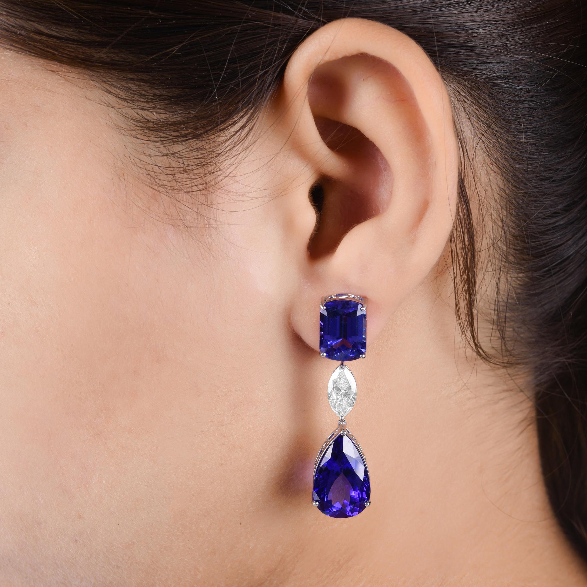 Fusi in oro a 14 carati, questi squisiti orecchini sono impreziositi da 27,84 carati di tanzanite e 2,03 carati di diamanti scintillanti.

Segui la vetrina di Spectrum Jewels per vedere le ultime collezioni e i pezzi esclusivi. Spectrum Jewels è