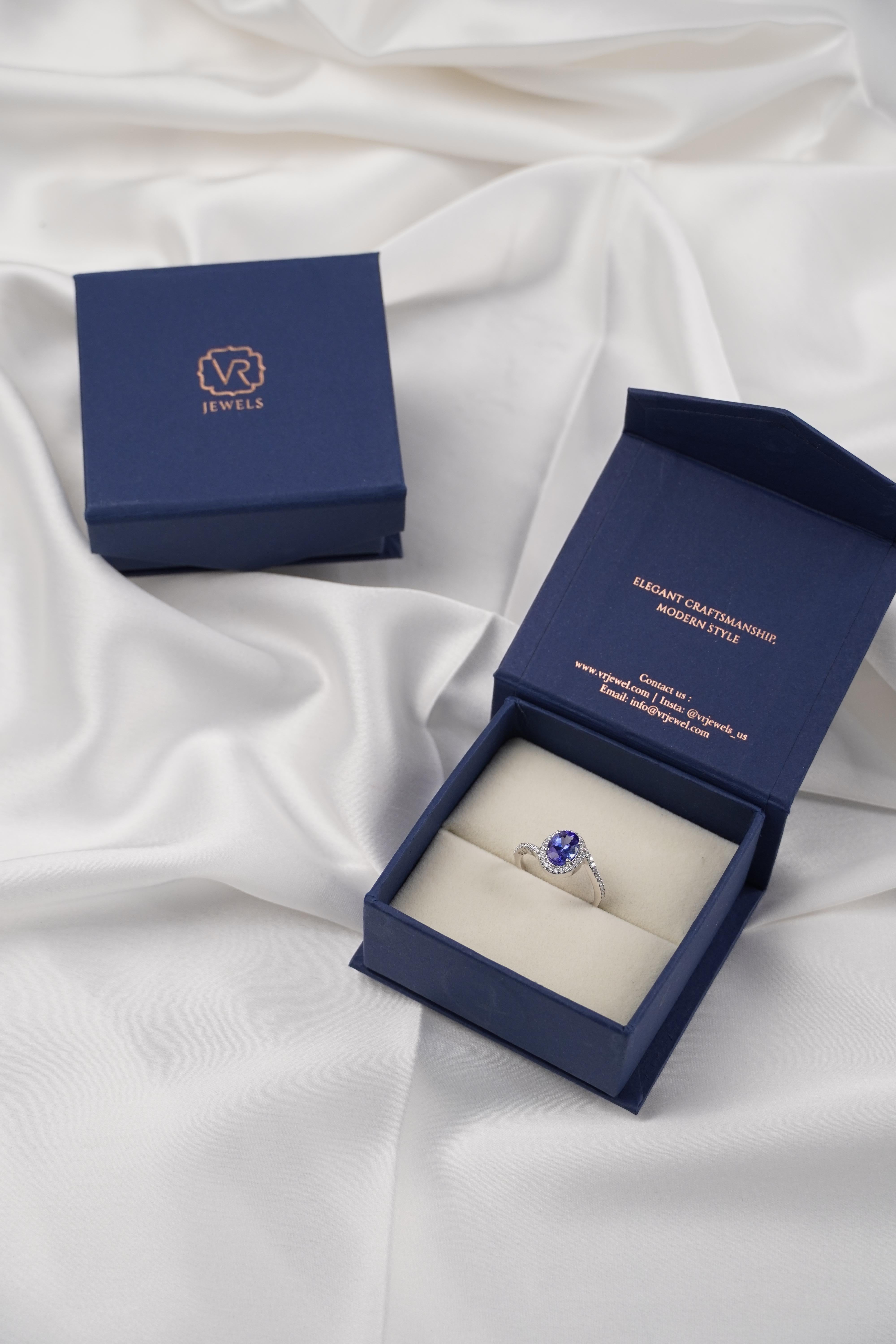 En vente :  Bague de fiançailles en or blanc 18 carats avec tanzanite et diamants 8