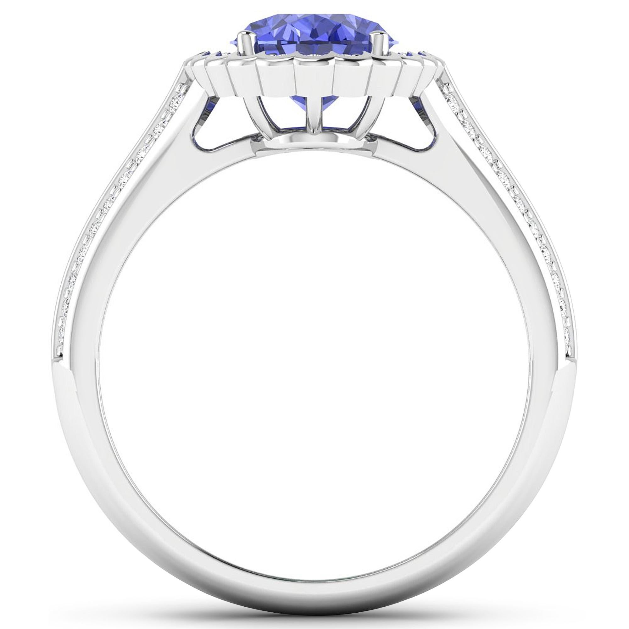 Tanzanite Gold Ring, 14Kt Gold Tanzanite & Diamond Engagement Ring, 2.02ctw.

Flaunt yourself with this 14K White Gold Tanzanite & White Diamond Engagement Ring. The setting is inlaid with 62 accented full-cut White Diamond round stones for a total
