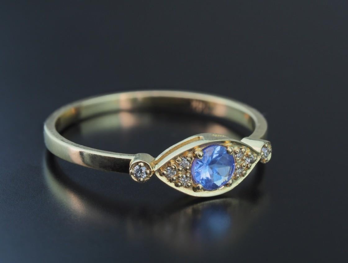 Round Cut Tanzanite gold ring.  For Sale