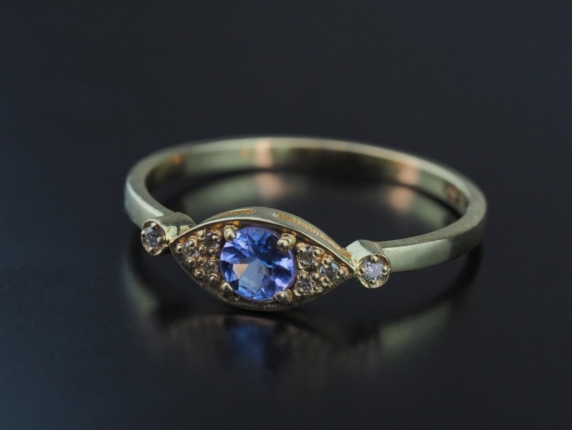 Women's Tanzanite gold ring.  For Sale