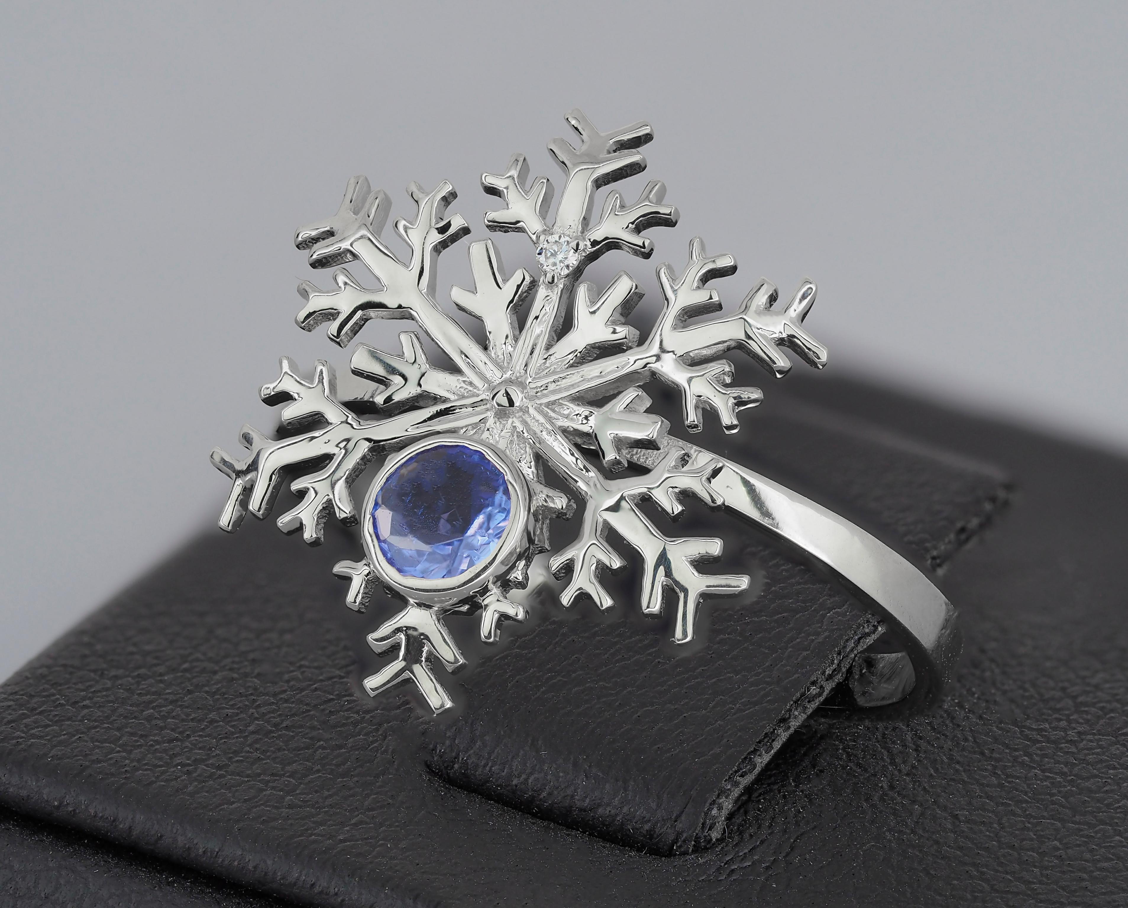 Snowflake 14kt solid gold ring with natural tanzanite and diamonds. December birthstone. Christmas jewelry. 
Tanzanite gold ring.
Weight: 1.85 g. - depends from size
Central stone: Natural tanzanite
Weight: approx 0.45 ct. in total, round
