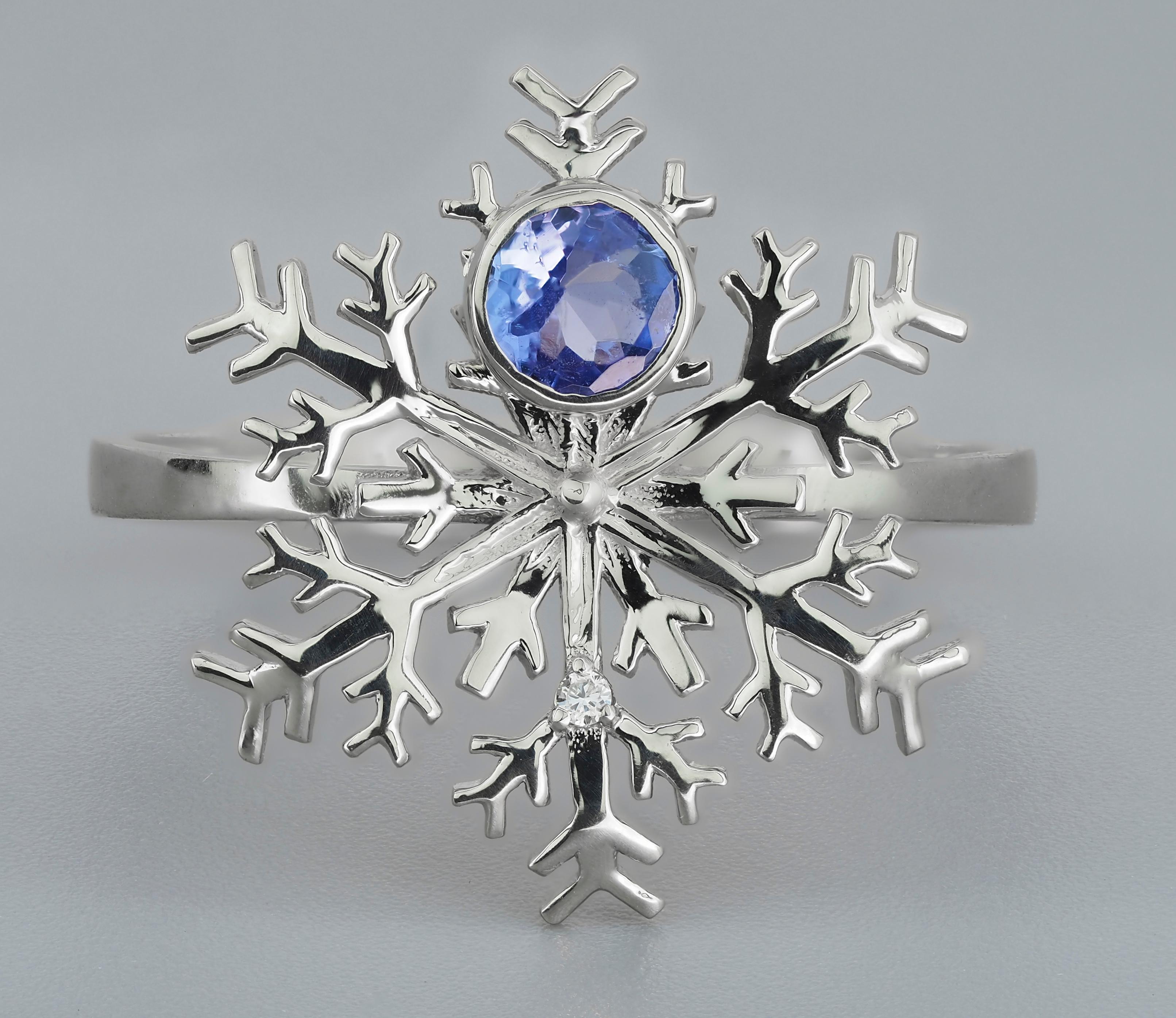 Women's Tanzanite gold ring. Snowflake 14 karat Gold Ring with Tanzanite and Diamonds.