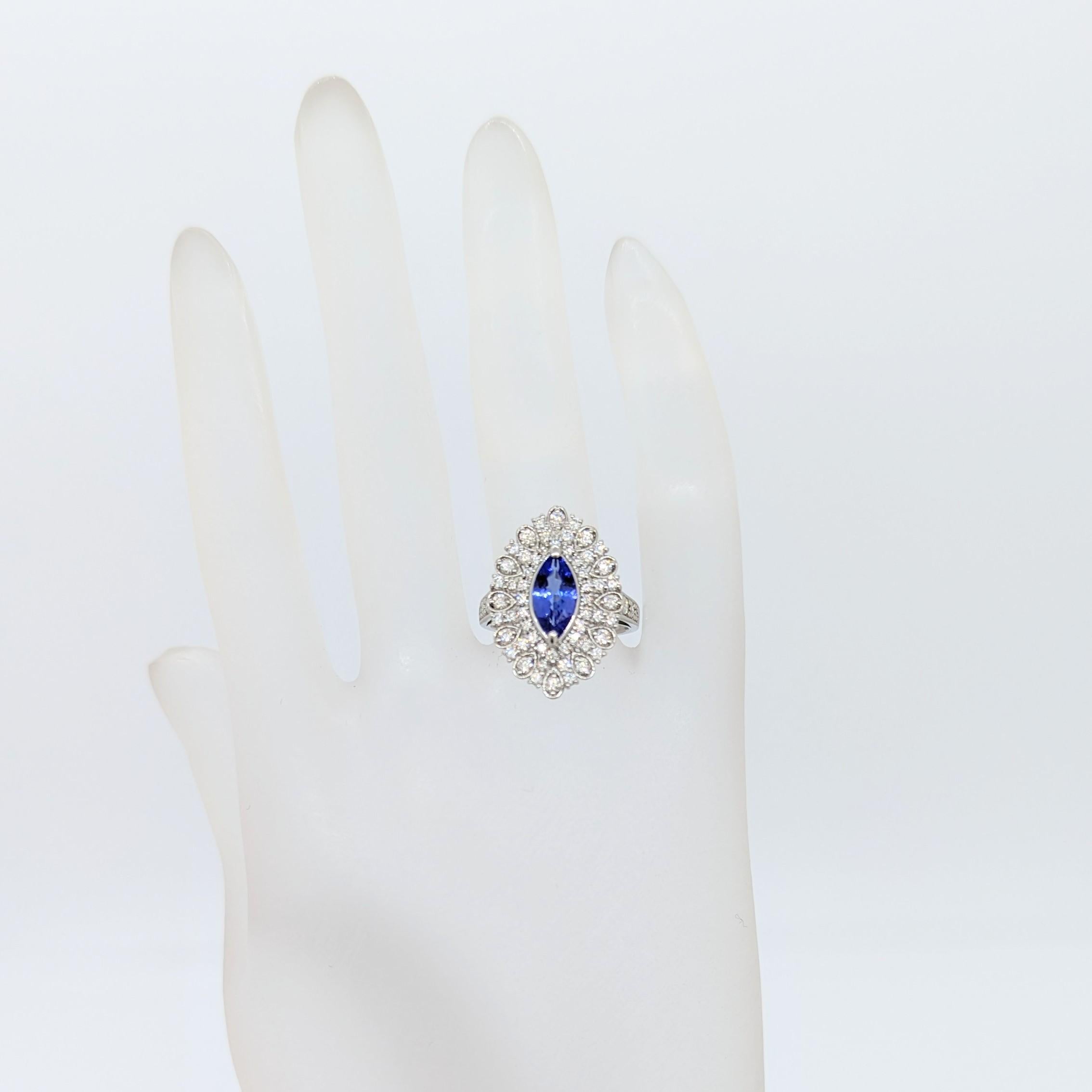 Marquise Cut Tanzanite Marquise and White Diamond Round Cocktail Ring in Platinum For Sale